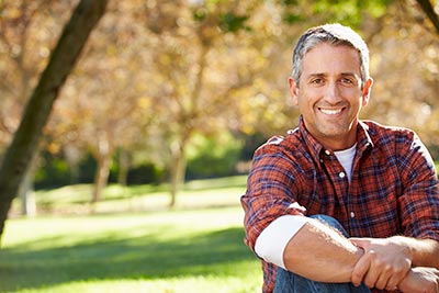 man smiling after a restorative dentistry procedure